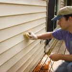 Washing Vinyl Siding Of House